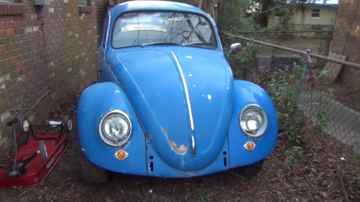 Unloading 1965 VW Beetle